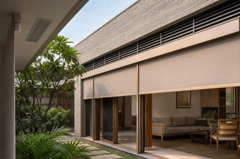Villa courtyard with automated solar shading, louvers and environmental sensors.
