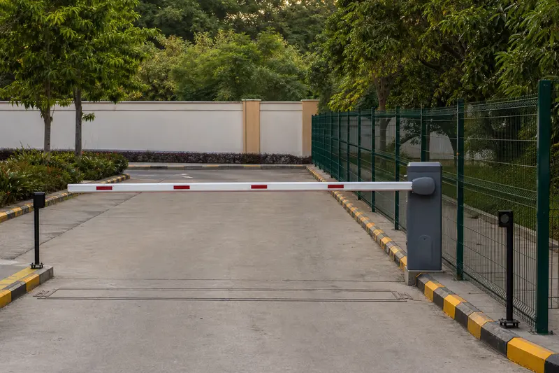 Protected boom lane with opposing safety photocells.