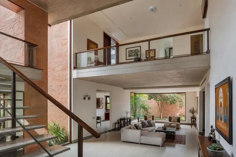 Two-storey villa illustrating wireless coverage across a concrete stair void.