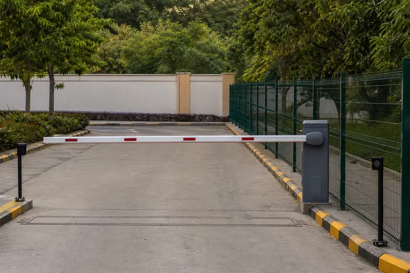 Protected boom lane with opposing safety photocells.