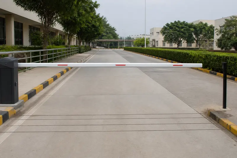 Hospital boom lane with paired photocells and loop grooves.