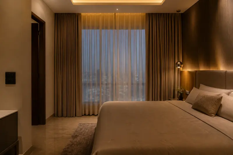 Automated bedroom lighting and curtains set for an evening scene