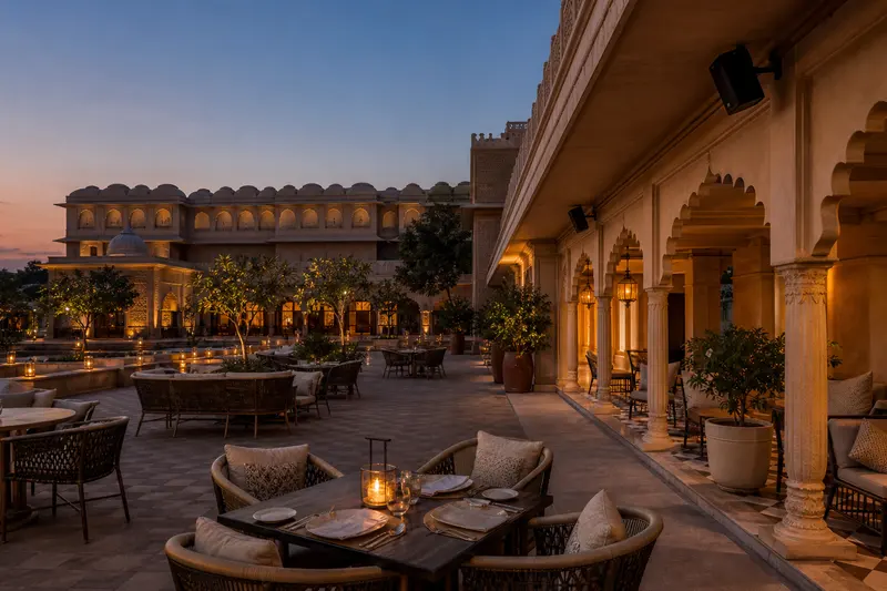 Resort dining courtyard with discreet under-eave background-music speakers.