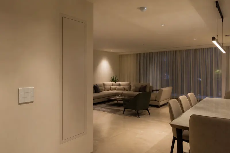 Finished hotel room demonstrates a safe KNX scene-control installation.