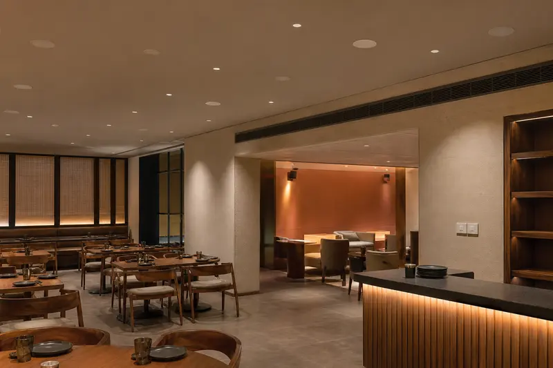 Two-zone restaurant background-music system.