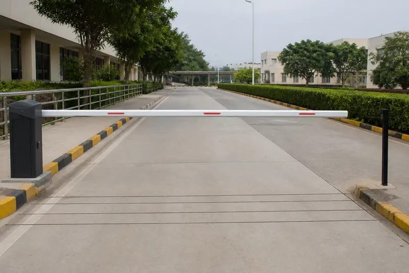 Hospital boom lane with paired photocells and loop grooves.