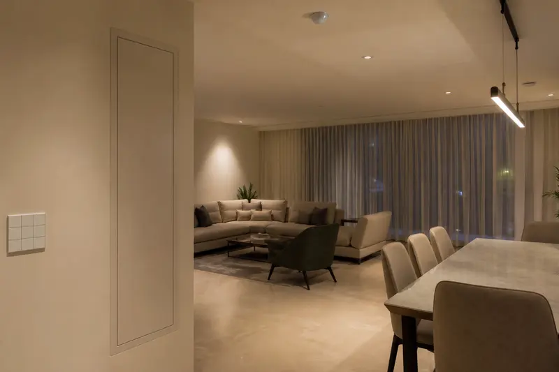 Finished hotel room demonstrates a safe KNX scene-control installation.
