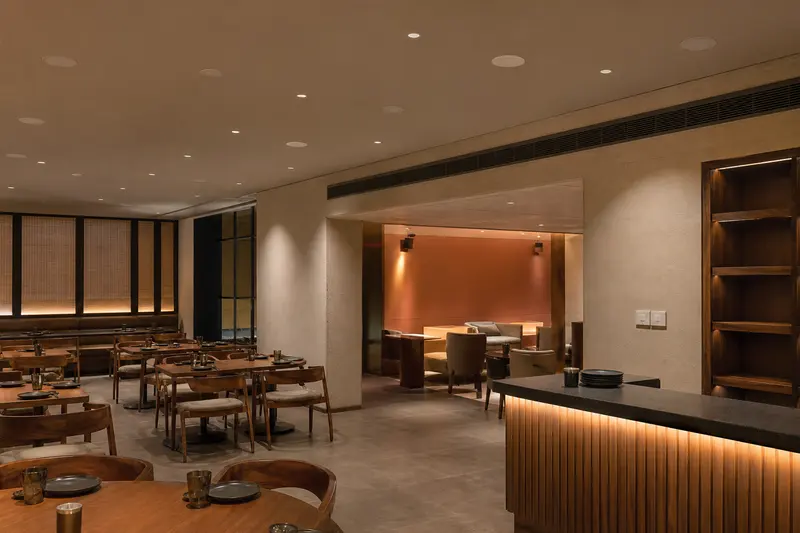 Two-zone restaurant background-music system.