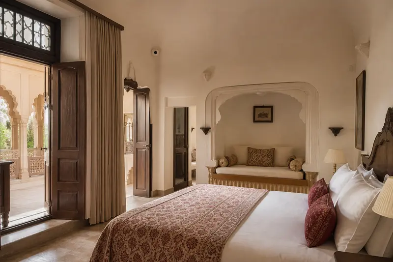 Heritage Rajasthan guest room with restrained sensor and concealed curtain automation.
